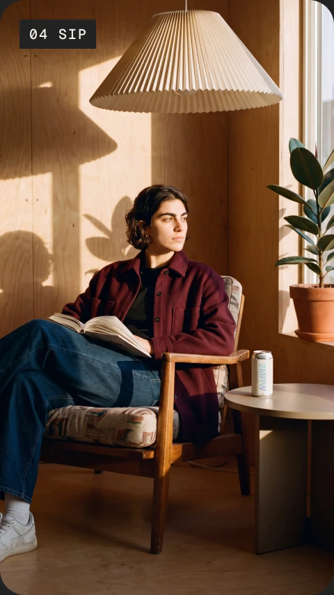 Story: a woman reading in an armchair