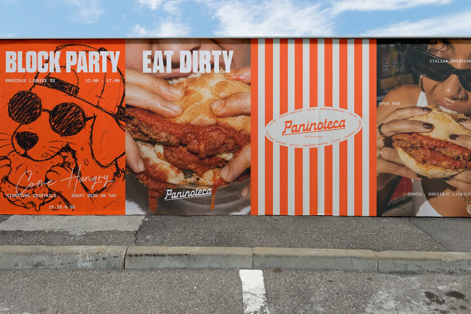 Block party and eat dirty posters pasted along a street wall.