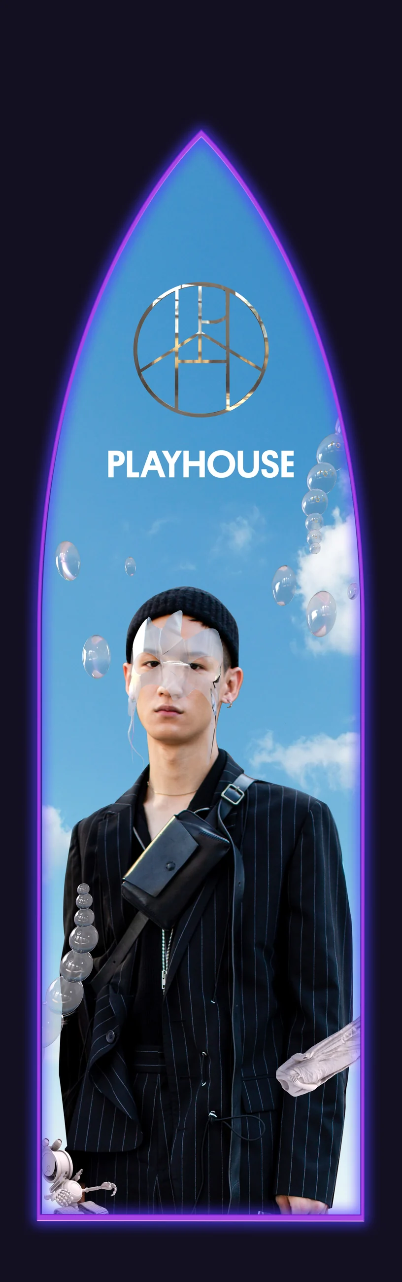 Tall arch banner: a model in a black jacket under the Playhouse symbol