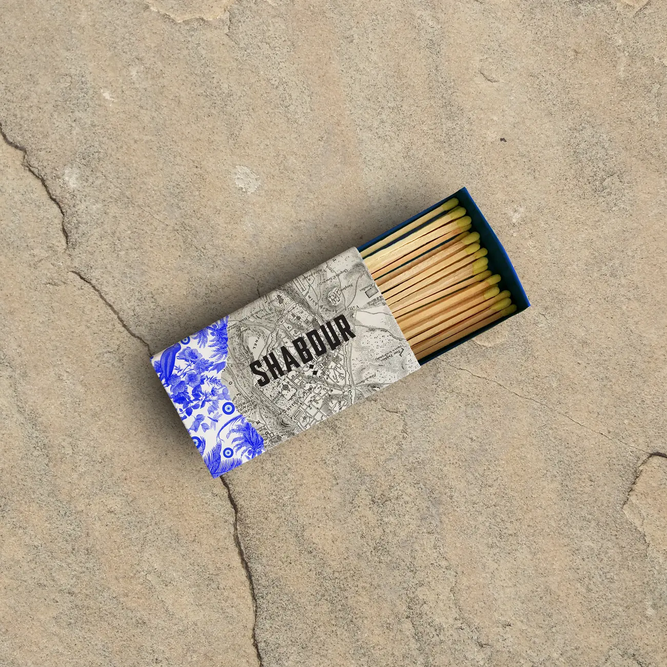 A Shabour matchbox on stone