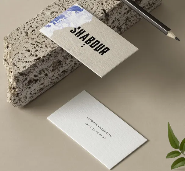 A letterpress Shabour business card on travertine