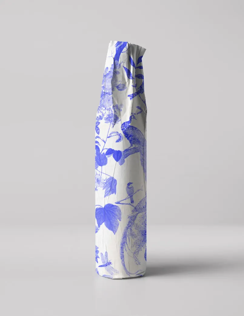 A bottle wrapped in the indigo toile